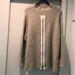 Gray sweater with cowl neck.